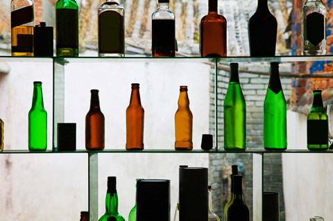 Framed Bottles displayed at foreigner bar, Old Town, Dali, Yunnan Province, China Print