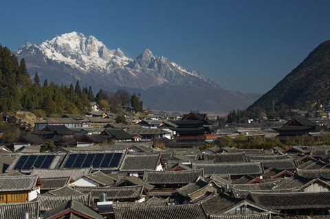 Framed High angle view of houses with Jade Dragon Snow Mountain in the background, Old Town, Lijiang, Yunnan Province, China Print