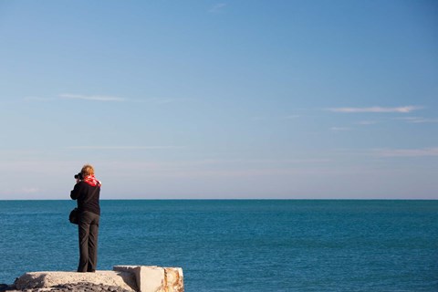 Framed Woman photographing with a camera at Le Cap d&#39; Agde, Herault, Languedoc-Roussillon, France Print