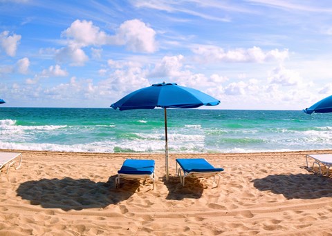 Framed Lounge chairs and beach umbrella on the beach, Fort Lauderdale Beach, Florida, USA Print