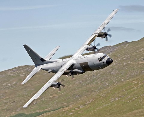 Framed C-130J Super Hercules low flying over North Wales on a training flight Print