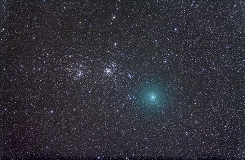 Framed Comet Hartley 2 as it approaches the Double Cluster in Perseus Print