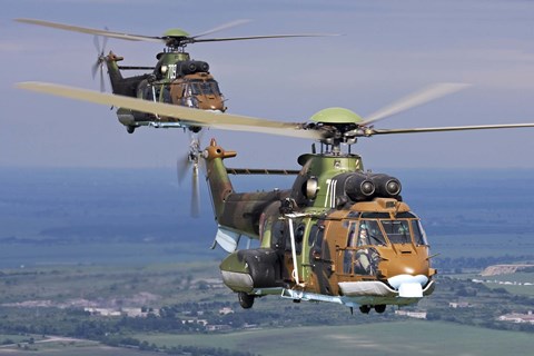 Framed Eurocopter AS532 Cougar helicopters in flight over Bulgaria Print