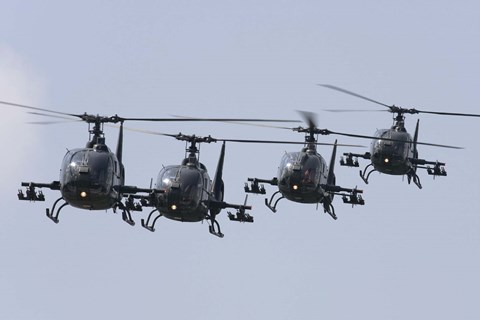 Framed Serbian Air Force Soko SA-342L GAMA choppers in flight over Serbia Print