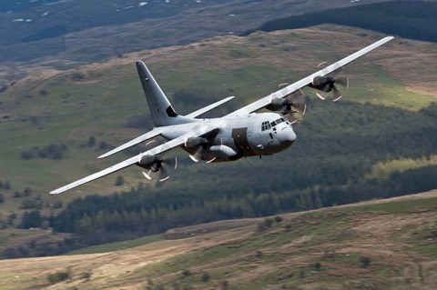 Framed C-130 Hercules of the Royal Air Force flying over North Wales Print