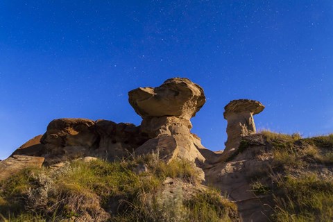 Framed Starry sky above hoodoo formations at Dinosaur Provincial Park, Canada Print