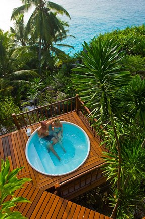 Framed Couple enjoying hot tub at Fregate Resort, Seychelles Print
