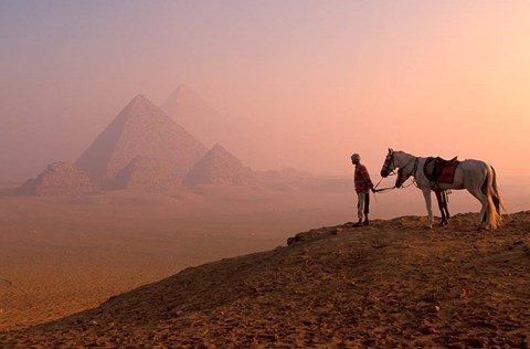 Framed Dawn View of Guide and Horses at the Giza Pyramids, Cairo, Egypt Print