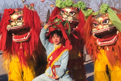 Framed Girl Playing Lion Dance for Chinese New Year, Beijing, China Print