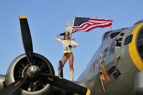 Framed 1940&#39;s style majorette pin-up girl on a B-17 bomber with an American flag Print