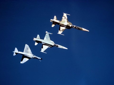 Framed Two F-5 Tiger II&#39;s and an A-4E Skyhawk in flight above the Pacific Ocean Print