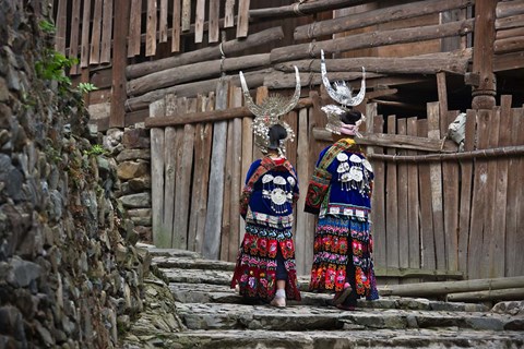 Framed Langde Miao girls in traditional costume in the village, Kaili, Guizhou, China Print