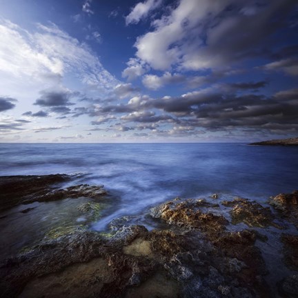 Framed Tranquil lake and rocky shore against cloudy sky, Crete, Greece Print