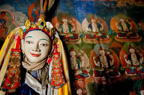 Framed Religious statue infront of Buddha mural at Shey Palace, Ladakh, India Print
