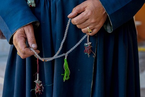 Framed Woman&#39;s hands holding prayer beads, Ladakh, India Print