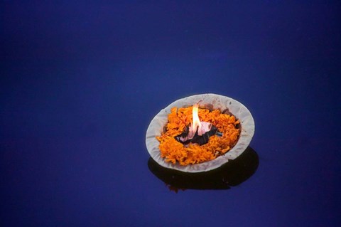 Framed Flower candle in the Ganges River, Varanasi, India Print