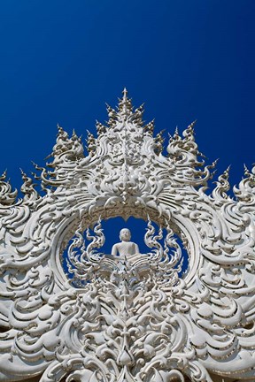 Framed new all white temple of Wat Rong Khun in Tambon Pa O Don Chai designed by Chalermchai Kositpipat. Print