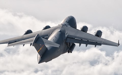 Framed C-17 Globemaster Above the Clouds Print