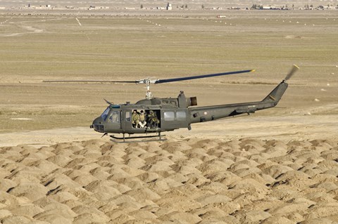 Framed Italian Army AB-205MEP Utility Helicopter Over Shindand, Afghanistan Print