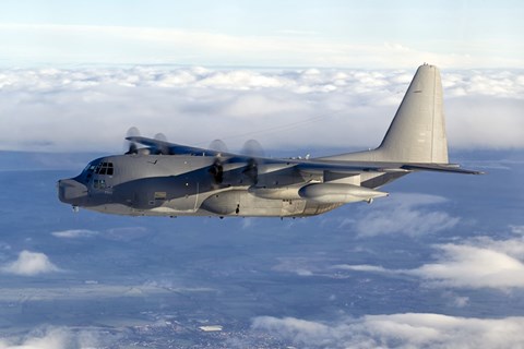 Framed MC-130P Combat Shadow Soars Above the Clouds Print
