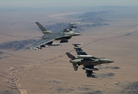 Framed Two F-16's on a training mission over the Arizona desert Print