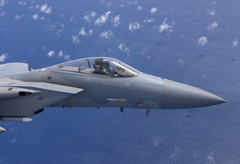 Framed F-15 Eagle Flies over the Pacific Ocean Print
