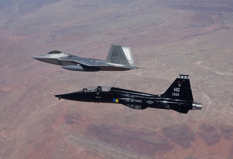 Framed F-22 Raptor and T-38 Talon Fly in Formation over New Mexico Print