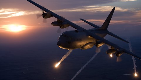 Framed C-130 Hercules Releases Flares over Kansas Print