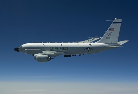 Framed RC-135W Rivet Joint Aircraft Flies over the Midwest Print
