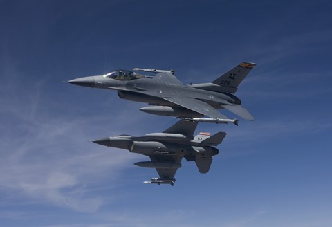 Framed Two F-16's Manuever on Air-to-Air Training Mission Print