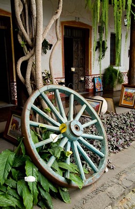 Framed Wagon Wheel, La Posada De Don Rodrigo Hotel, Antigua, Guatemala Print