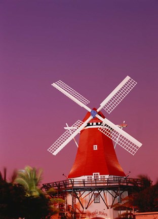 Framed Mill Resort against pink sky, Oranjestad, Aruba Print