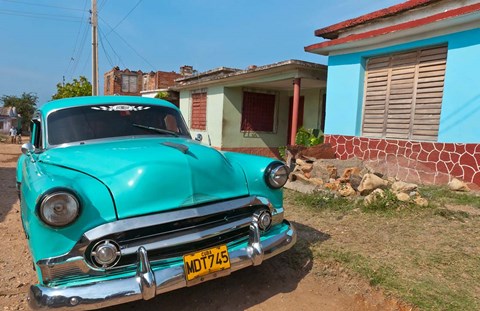 Framed Trinidad, Cuba, blue classic 1950s Chevrolet car Print