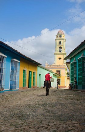 Framed Cobblestone street with cowboy on horse, Trinidad, Cuba Print