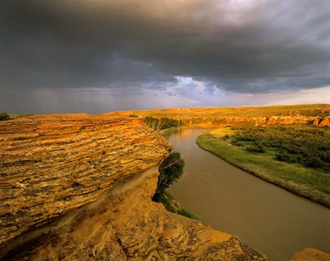 Framed Approaching storm on the Milk River at Writing on Stone Provincial Park, Alberta, Canada Print