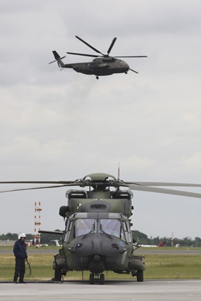 Framed German Army NH90 and its Predecessor, the CH-53 Sea Stallion Print