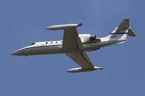 Framed United States Air Forces Europe C-21A Learjet in Flight over Germany Print
