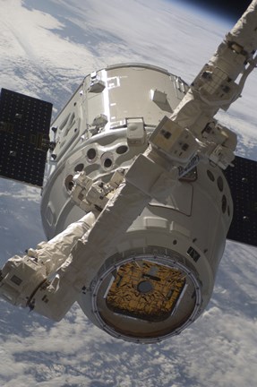 Framed SpaceX Dragon Commercial Cargo Craft during Grappling Operations with Canadarm2 Print