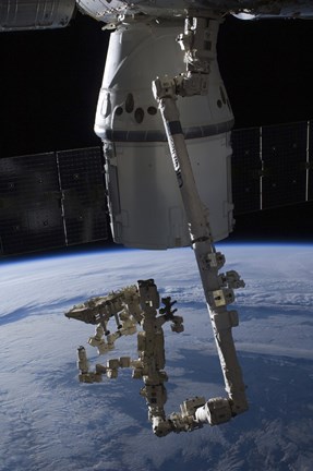 Framed SpaceX Dragon Commercial Cargo Craft Berthed to the ISS Print