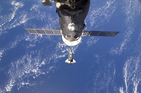 Framed Space Shuttle Discovery approaches the International Space Station Print