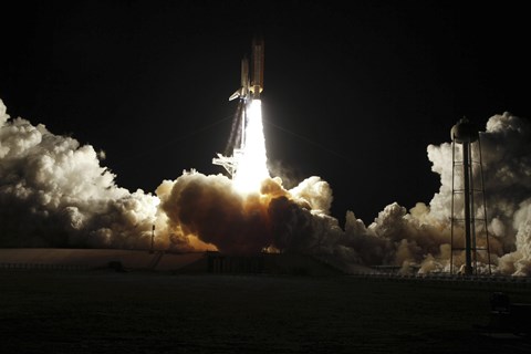 Framed Space shuttle Discovery lifts off from Launch Pad 39A at Kennedy Space Center in Florida, on the STS-131 mission Print