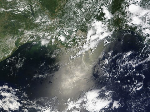 Framed Satellite view of Streaks and Ribbons of Oil Brighten the Reflection of the Sun off the Gulf of Mexico Print