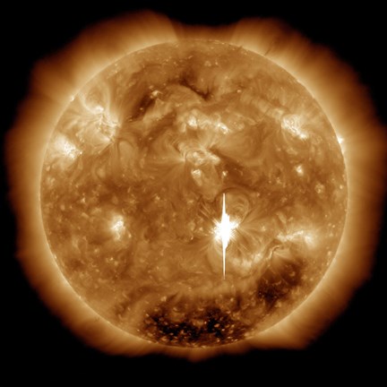 Framed Massive X-Class Solar Flare Erupts on the Sun Print