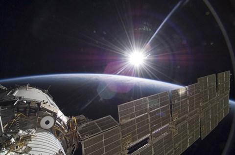 Framed International Space Station Backdropped by the Bright Sun over Earth&#39;s Horizon Print