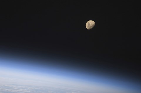 Framed Gibbous Moon Visible above Earth's Atmosphere Print