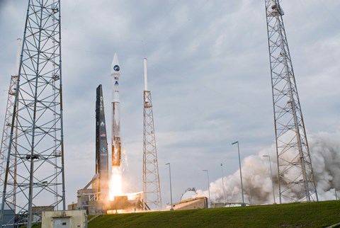 Framed Fire and Smoke Signal the Liftoff of the Atlas V/Centaur Launch Vehicle Print