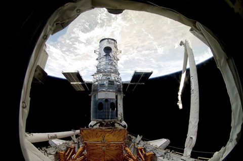 Framed Hubble Space Telescope, Locked Down in the Cargo Bay of Space Shuttle Atlantis Print