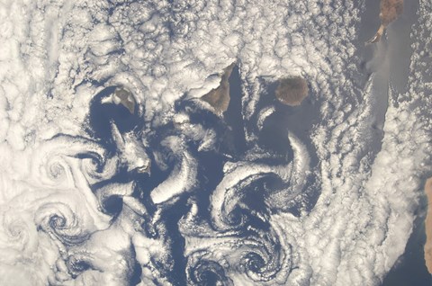 Framed Cloud Vortices in the area of the Canary Islands in the North Atlantic Ocean Print