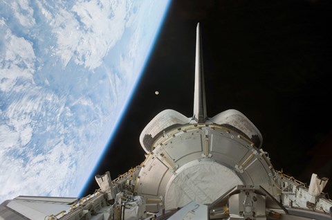 Framed Space Shuttle Discovery's Payload Bay Backdropped by Earth's Horizon Print