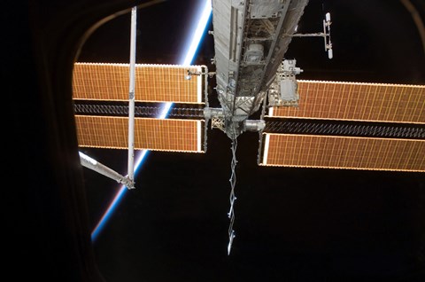 Framed International Space Station Backdropped by the Airglow Above Earth's Horizon Print